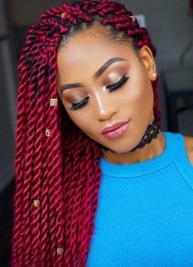 A beautiful red twist braids hairstyle 